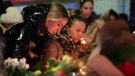 Бдение в Кран Монтана, трудно идентифицират телата на загиналите СНИМКИ