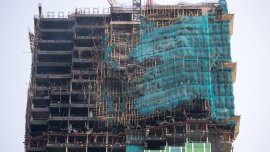 94 са вече жертвите от пожара в небостъргачите в Хонконг