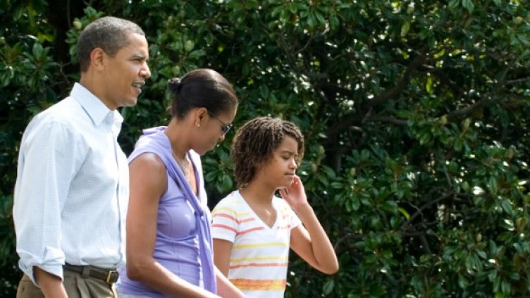Семейство Обама с едната от дъщерите си. Снимка: Getty Images/Guliver Photos
