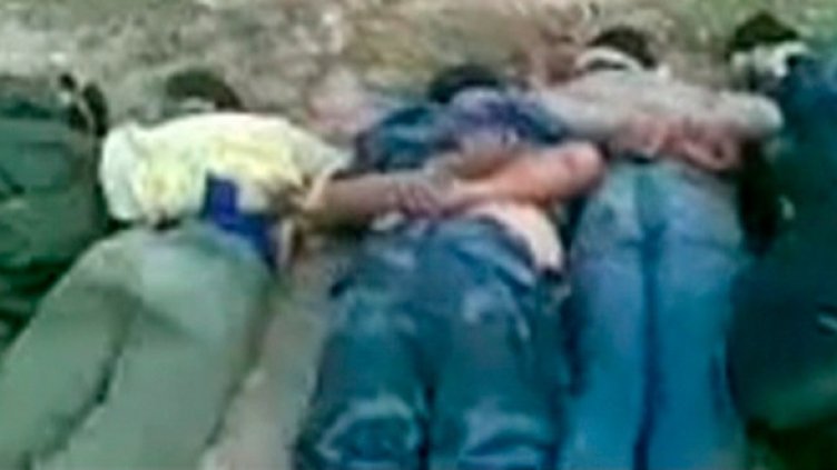 Снимка на мъртви тела с вързани на гърба ръце в източния либийски град Дерна, качена в YouTube. Снимка: Ройтерс