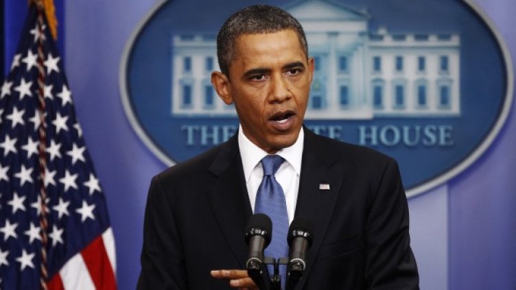 Барак Обама, в случая изслушван от журналисти. Снимка: Ройтерс