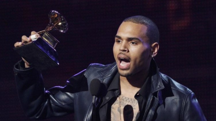 Рапърът при получаването на наградата. Снимка: Reuters