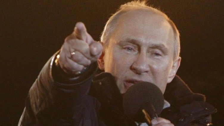 Владимир Путин се радва на победата си. Снимка: Reuters