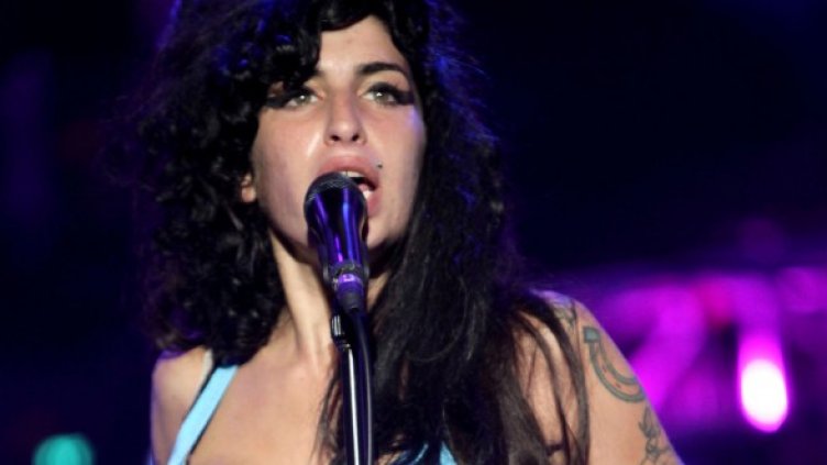 Nas не бил сигурен за записа на дуета с Ейми, Снимка: Reuters