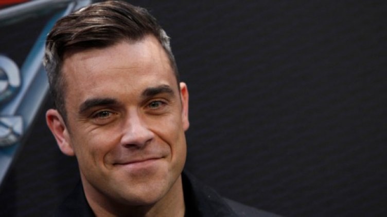 Роби Уилямс успешно се бори с пороците. Снимка: Reuters