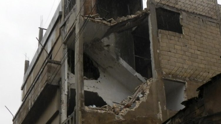 Разрушена сграда в град Хомс, Сирия. Снимка: Reuters