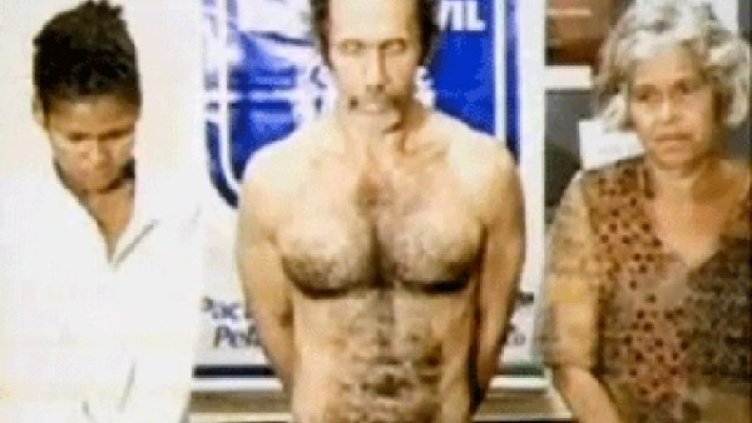 Арестуваните предполагаеми канибали. Снимка: YouTube