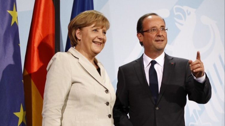 Меркел и Оланд обещаха да работят за икономически растеж в Европа. Снимка: Reuters