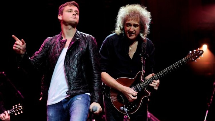 Том Чаплин на сцената с Брайън Мей. Снимка: Getty Images