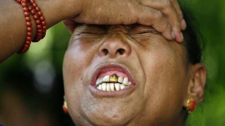 Китайка изпуши от болезнена ревност по любимия си. Снимка: Reuters