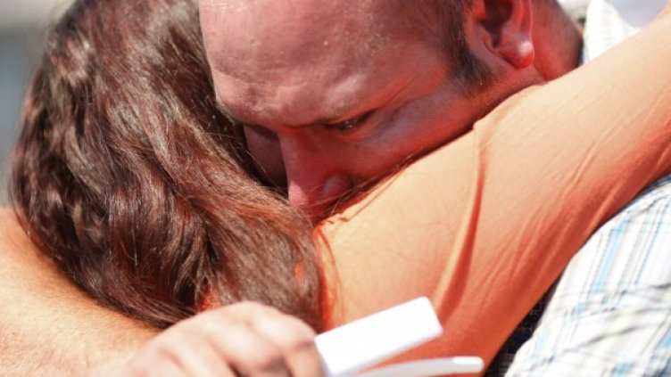 Американците имали нужда от гушкане. Снимка: Reuters