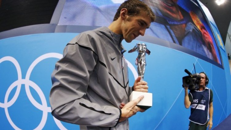 На 27 години на Майкъл Фелпс му писна от вода и медали. Снимка: Reuters