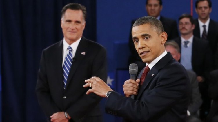Мит Ромни и Барак Обама по време на дебата. Снимка: Reuters
