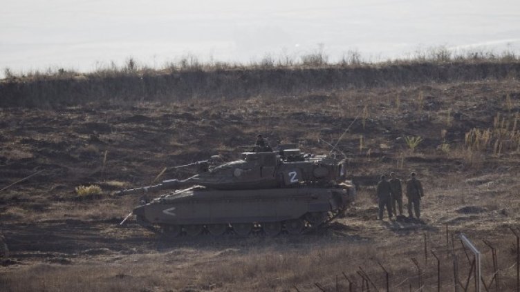 Израелски войници на Голанските възвишения. Снимка: Reuters