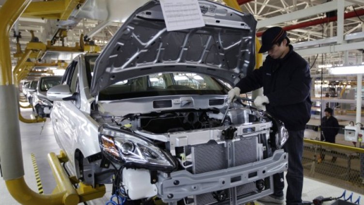 Китай се превръща в автомобилното Елдорадо  Фабрика за автомобили на компанията Beijing Electric Vehicle Company. Снимка: Ройтерс