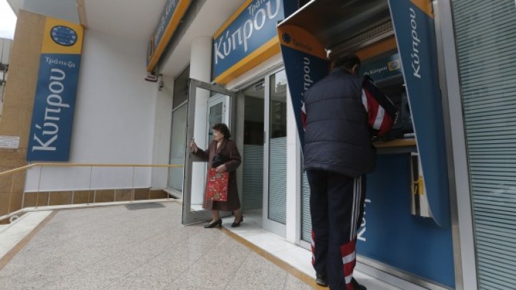 Банките в Кипър ще отворят днес. Снимка: Reuters