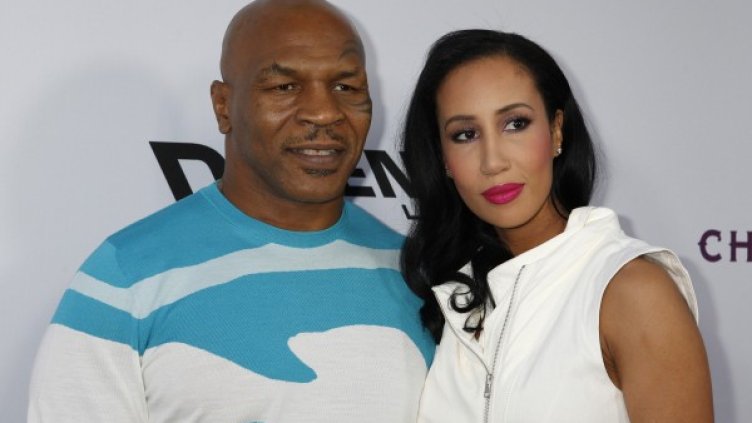 Майк Тайсън и съпругата му Лакиа Спасйсър. Снимка: Reuters