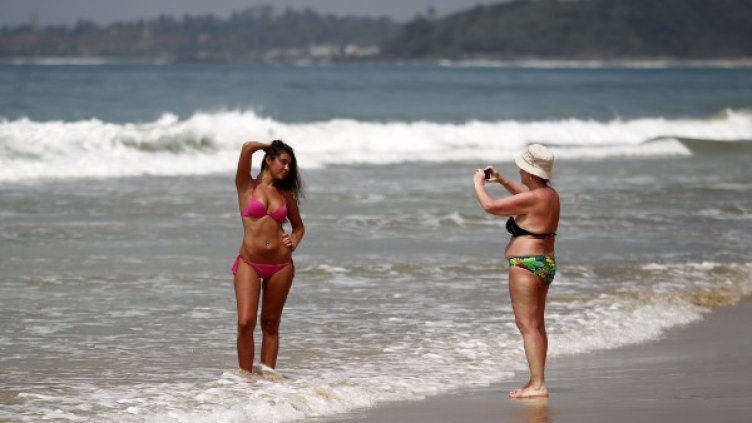 Хората са по-красиви през лятото. Снимка: Reuters