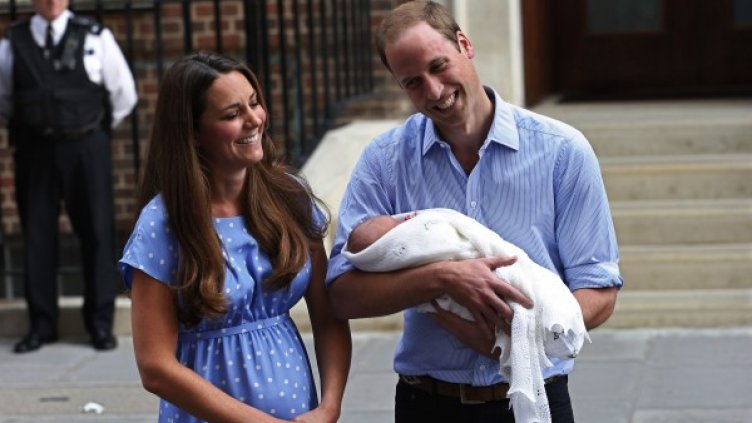 Щастливите мама и татко с малкия Джордж. Снимка: Reuters