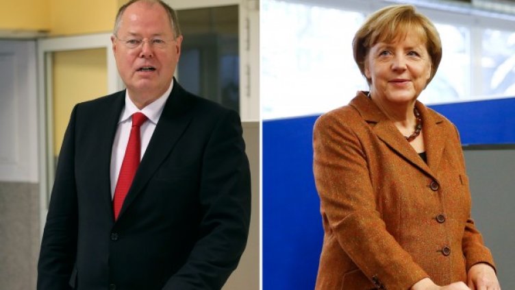 Пеер Щайнбрюк и Ангела Меркел. Снимка: Reuters