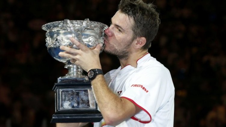 Вавринка с трофея. Снимка: Ройтерс