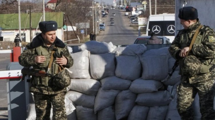 Украинска гранична охрана на пропускателен пункт на границата с Молдова. Снимка: архив, Reuters