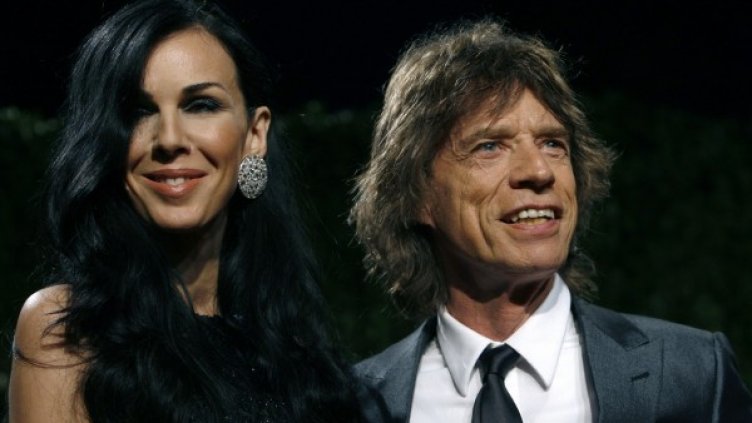 Самоубилата се през март дизайнерка Лорън Скот и Мик Джагър, Снимка: Reuters