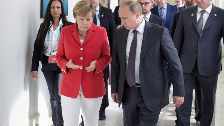 Ангела Меркел и Владимир Путин Снимка: архив, Reuters