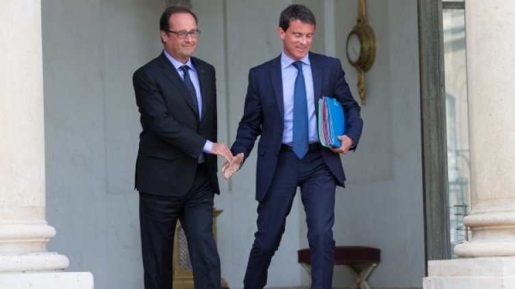 Президентът Оланд и премиерът Валс (вдясно). Снимка: Ройтерс