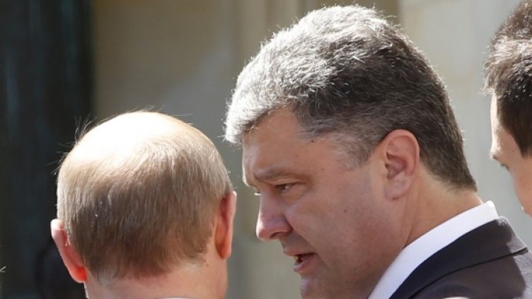 Владимир Путин и Петро Порошенко. Снимка: архив, Reuters