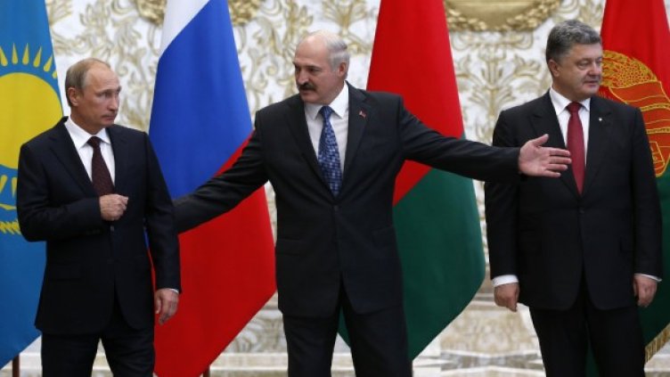 Владимир Путин, Александър Лукашенко и Петро Порошенко. Снимка: Reuters
