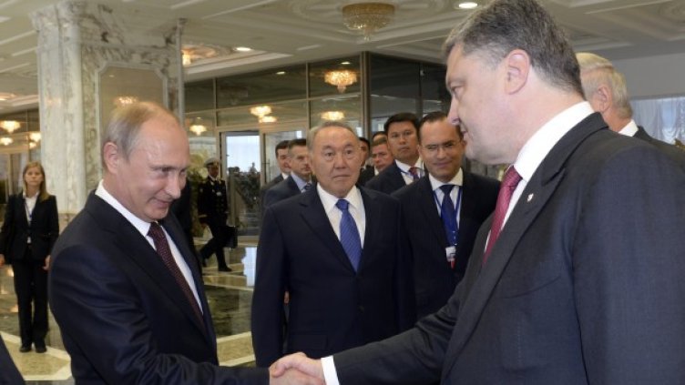 Владимир Путин и Петро Порошенко. Снимка: Reuters