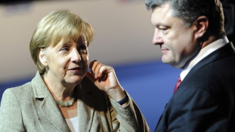 Меркел и украинският президент Порошенко. Снимка: Ройтерс