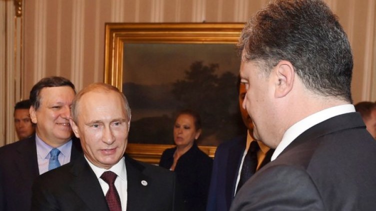 Владимир Путин и Петро Порошенко. Снимка: Reuters