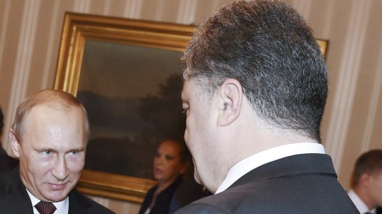 Владимир Путин и Петро Порошенко. Снимка: Reuters