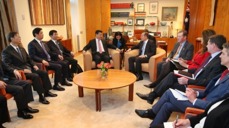 Китайският президент Си Цзинпин и австралийският премиер Тони Абът. Снимка: Reuters