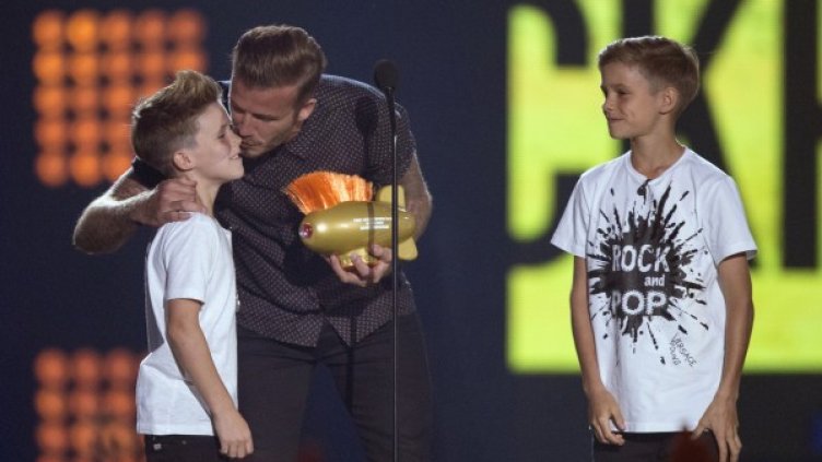 Дейвид Бекъм и двама от синовете му. Снимка: Архив Reuters