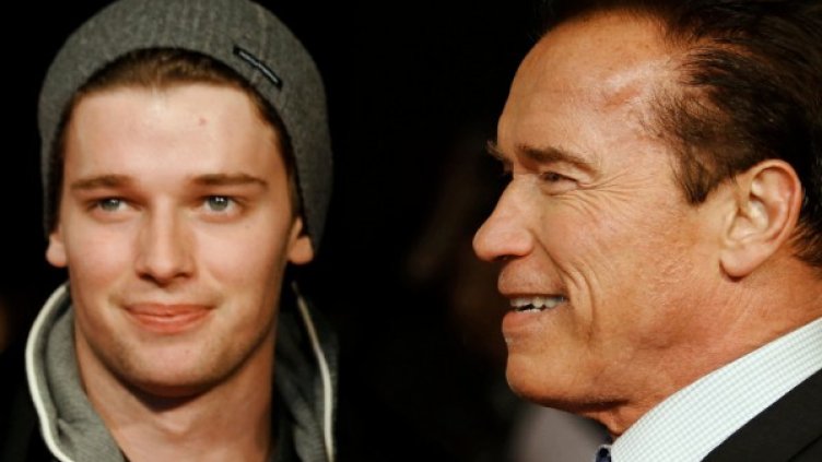 Арнолд със сина си през 2013 г. Снимка: архив, Reuters