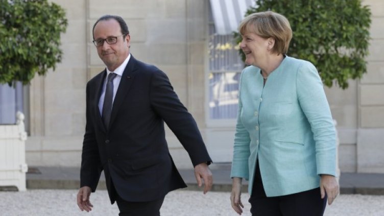 Франсоа Оланд и Ангела Меркел. Снимка: Reuters