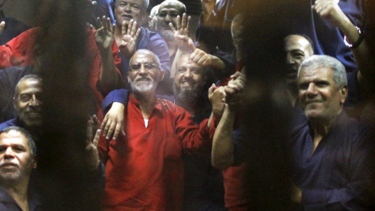 Бадиа (в средата) и някои от съмишлениците му Снимка: Reuters