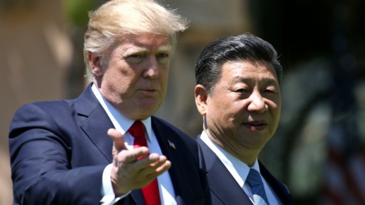 Президентите на САЩ и Китай по време на двустранна среща в имението на Тръмп в Мар а Лаго, щата Флорида. Източник: Reuters