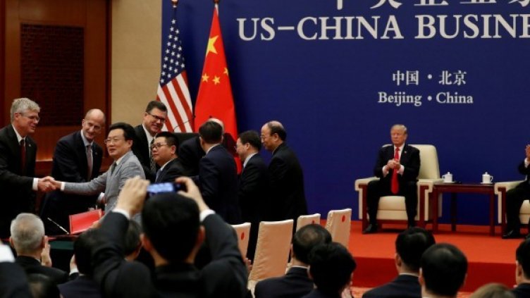 Тръмп и Си по време на двустранен икономически форум в Пекин. Снимка: архив Ройтерс