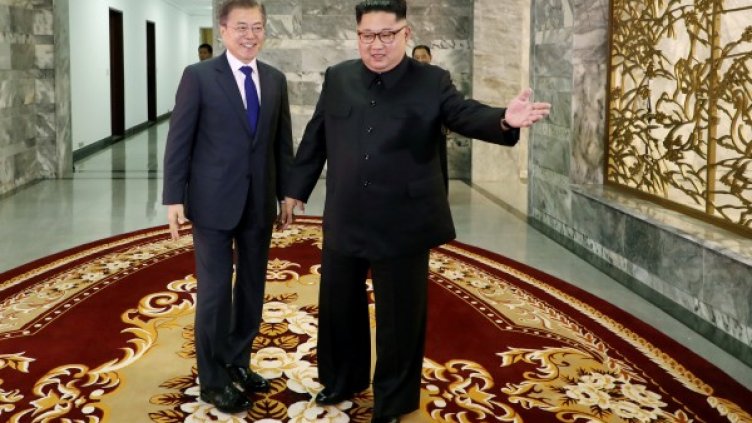 Мун Дже Ин и Ким Чен Ун. Снимка: архив, Reuters