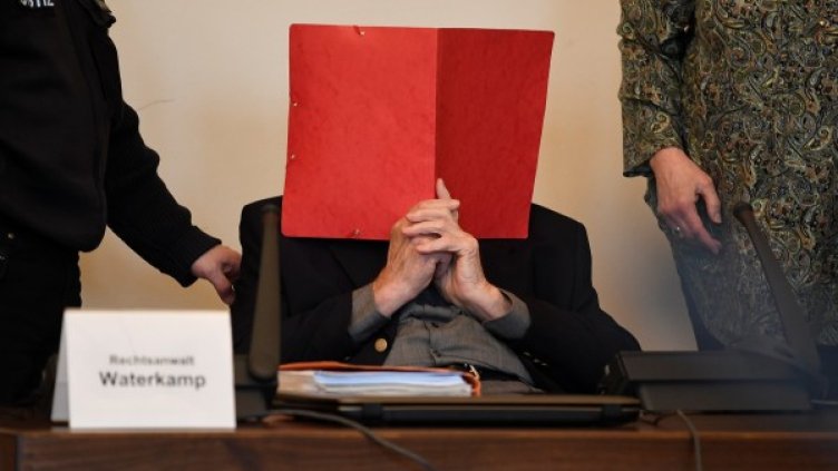 В съда Бруно Дей скри лицето си. Снимка: Reuters