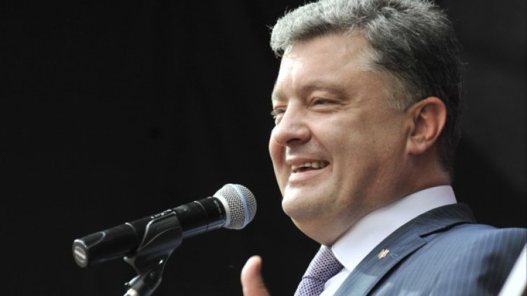 Шоколадовият крал Порошенко променя позицията на Путин 
