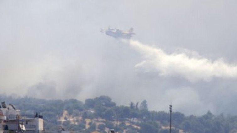 Пожарите в Гърция взеха първата си жертва