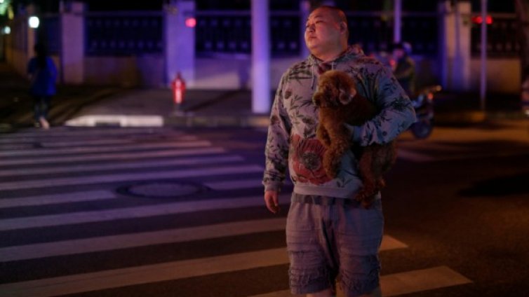 Китайски град: Едно семейство &ndash; едно куче