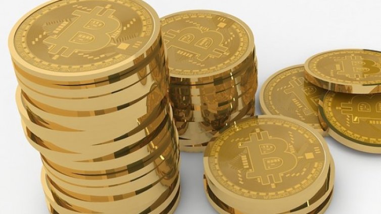 Рекордно поскъпване на биткойна до $66 000