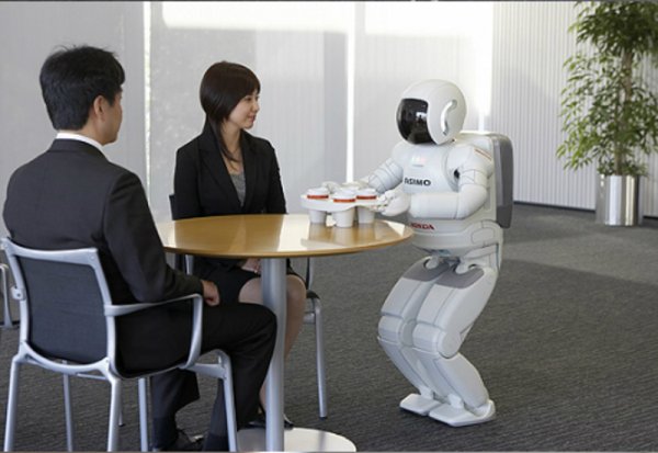 На тази снимка е предишната версия на ASIMO. Снимка: Honda Motor Co.