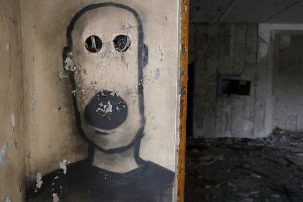 Графити в жилищна сграда в Припят. Снимка: Reuters